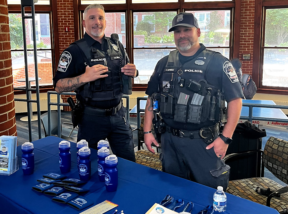 Police officers at a PFPA recruiting event.